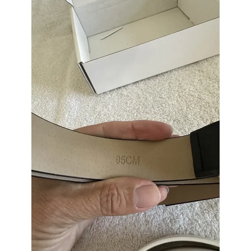 2 Belts. One Black, One White. 95cm. See Pictures For Missing Piece.